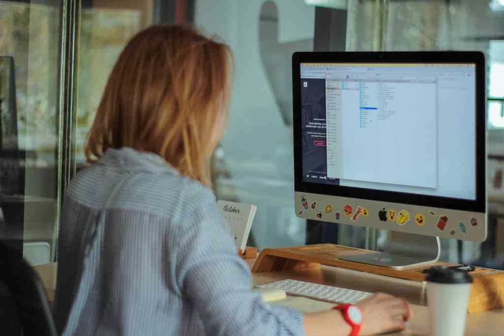 Woman focused and on-task at computer