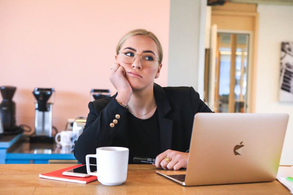 sad woman at computer