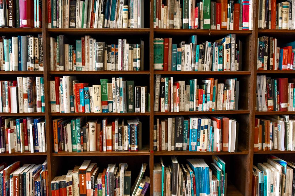 Library shelves with books